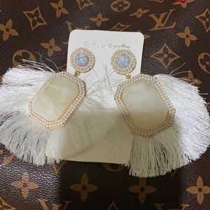 Beautiful white statement earrings